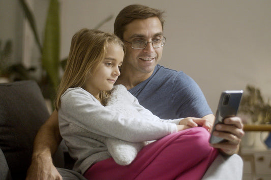 A divorced parent staying connected with a child through a calm video call