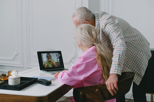 Seniors in a retirement home using connection tools and sharing activities